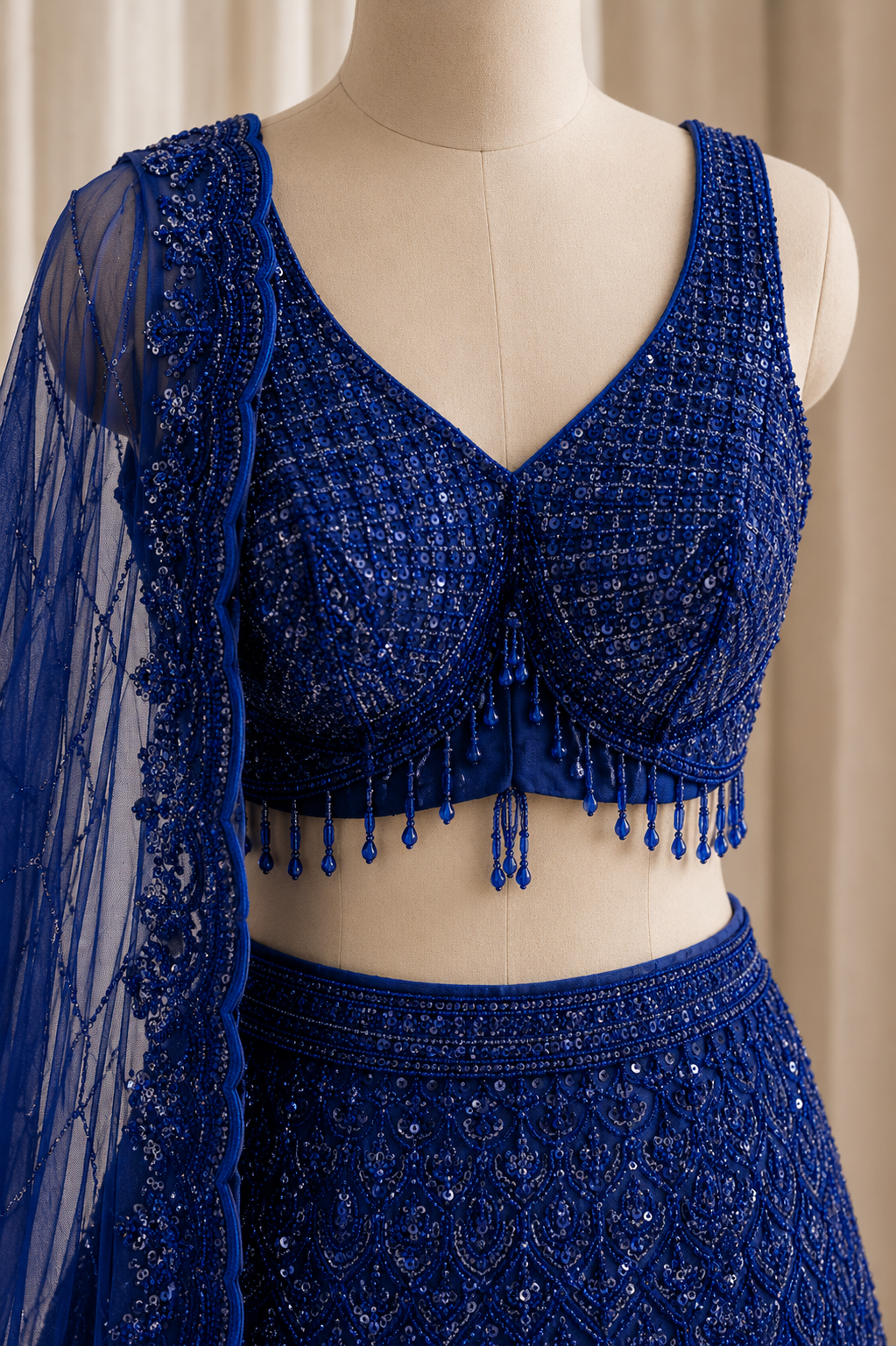 Fascinating Sequins Work and Soft Net Fabric Royal Blue Color Fishcut Lehenga Choli