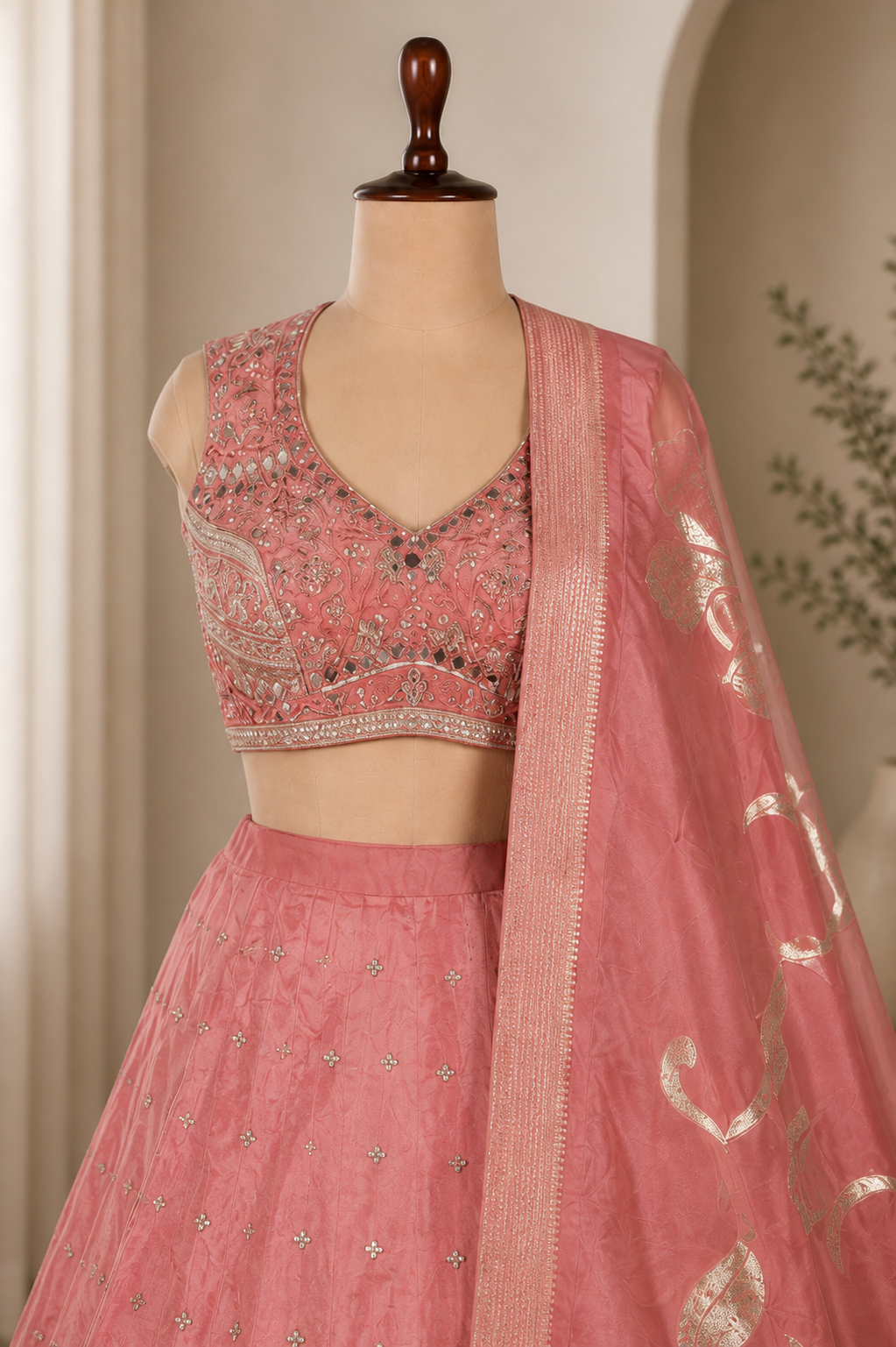 Gorgeous Peach-Pink Lehenga With Mirror, Zari And Zardozi Work
