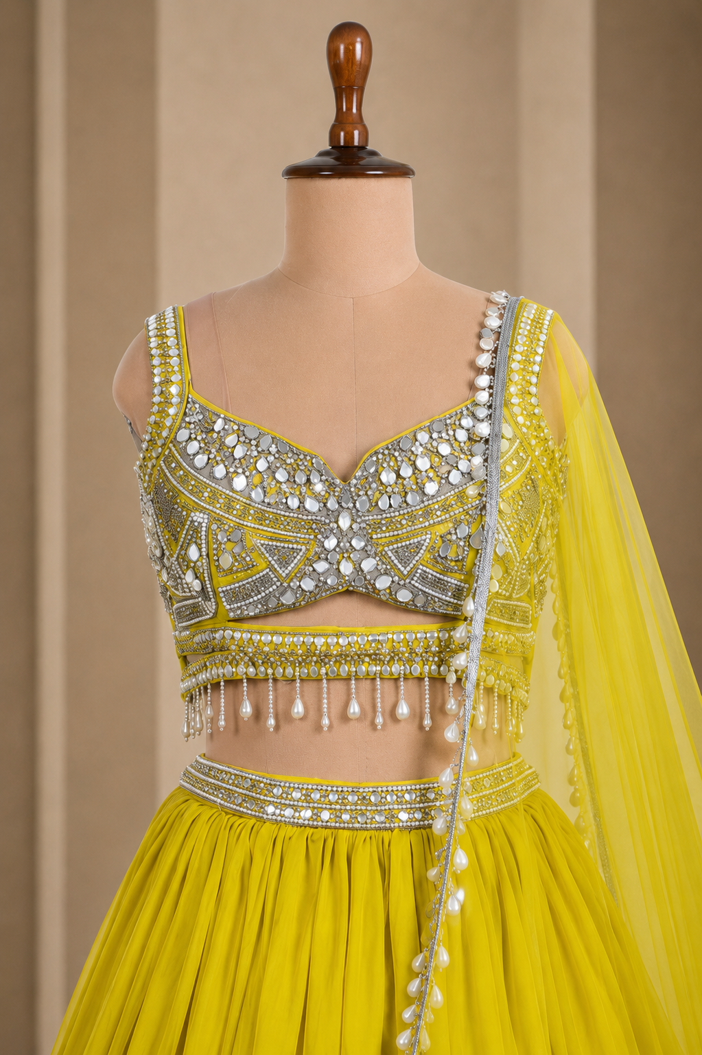 Designer Yellow Lehenga With Pearls And Designer Bead Work
