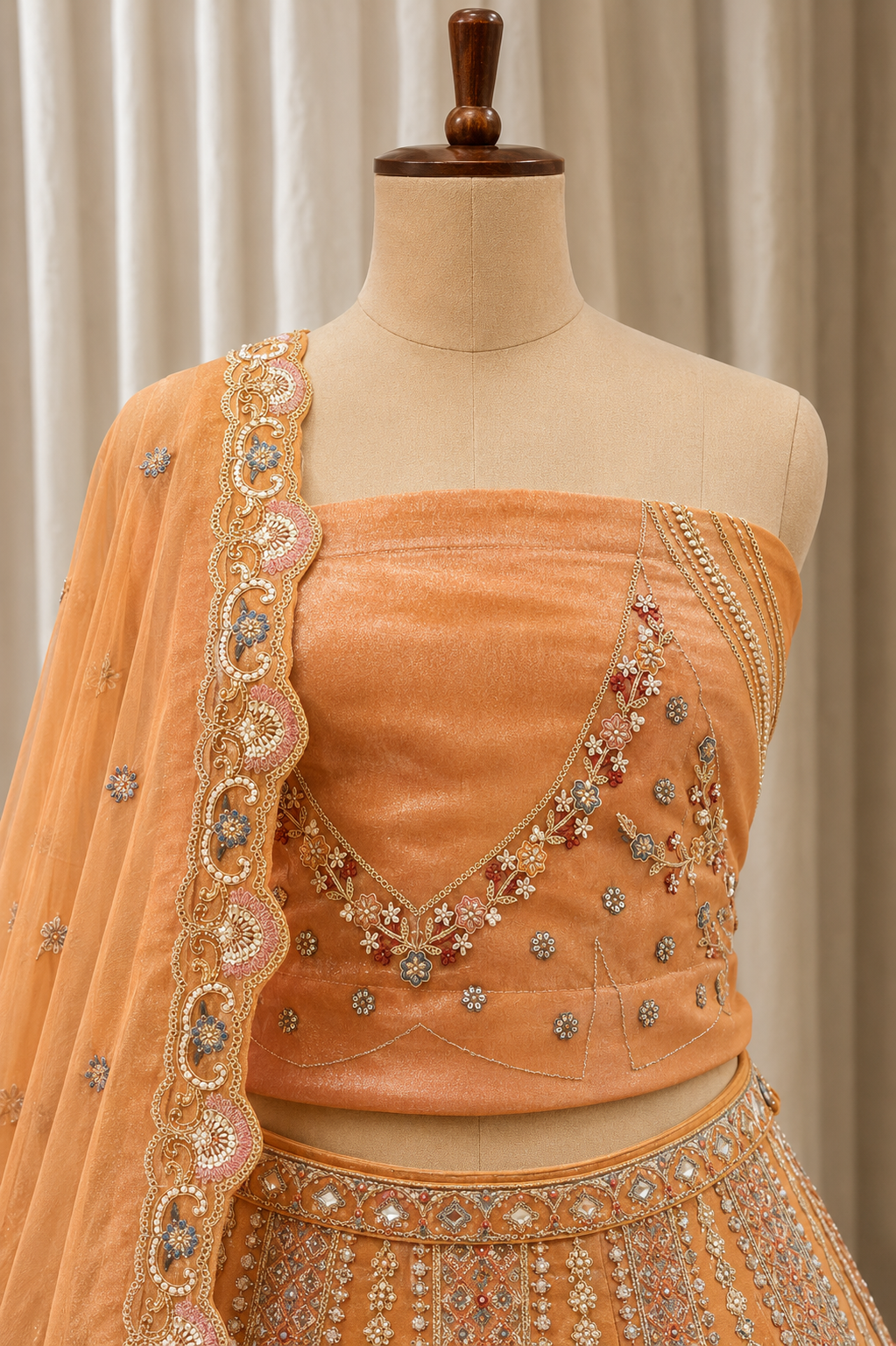 Elegance Tissue Fabric and Orange Color With Kasab Work Lehenga Choli