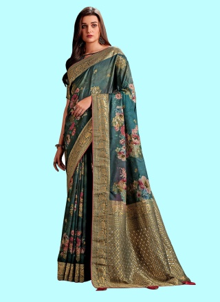 Adorning Teal Weaving Silk Saree