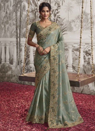 Aristocratic Embroidered Fancy Fabric Green Saree